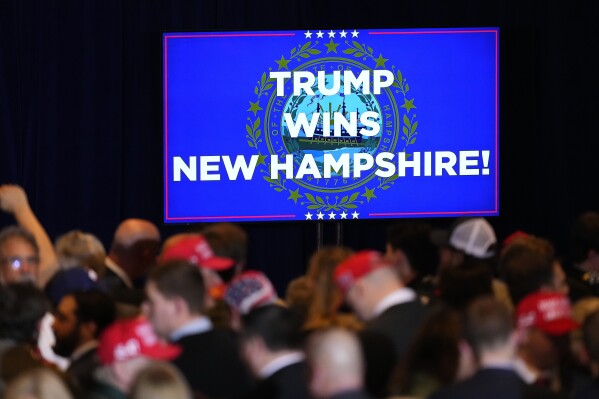 Supporters gather before Republican presidential candidate former President Donald Trump speaks at a primary election night party in Nashua, N.H., Tuesday, Jan. 23, 2024. (AP Photo/Pablo Martinez Monsivais)